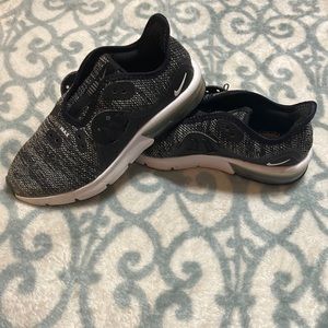 Black and white Nike AirMax.